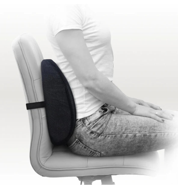 Side view of a person using an orthopedic back cushion for lumbar support and pain relief